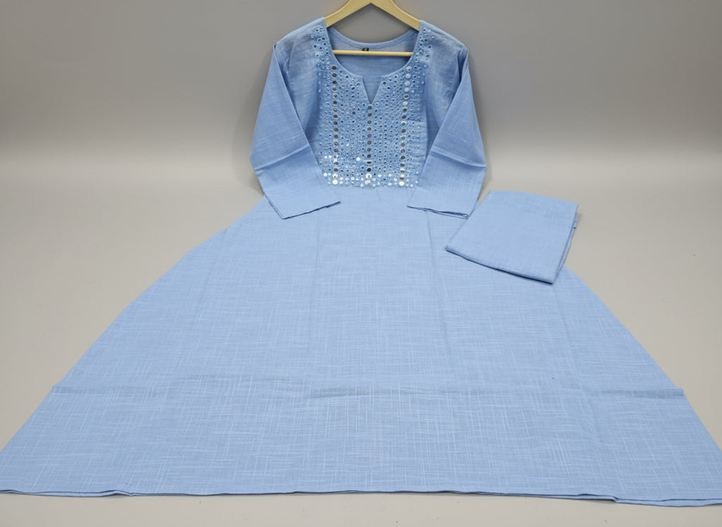 Please make a aesthete background of the dress with natural illumination, without changing the subjected picture
