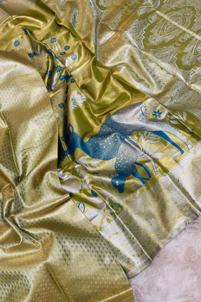 Golden Olive Nature’s Symphony Tissue Silk Saree – Teal Deer Motif Edition